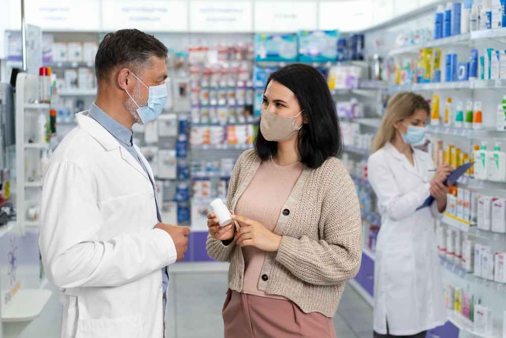 pharmacist helping patient