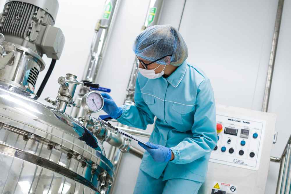 scientist in blue lab uniform